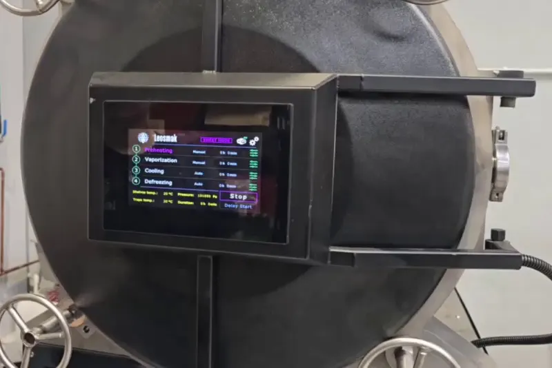 Freeze-dryer controller running a dedicated sweets programme, showing four stages: preheating, vaporization, cooling and defreezing
