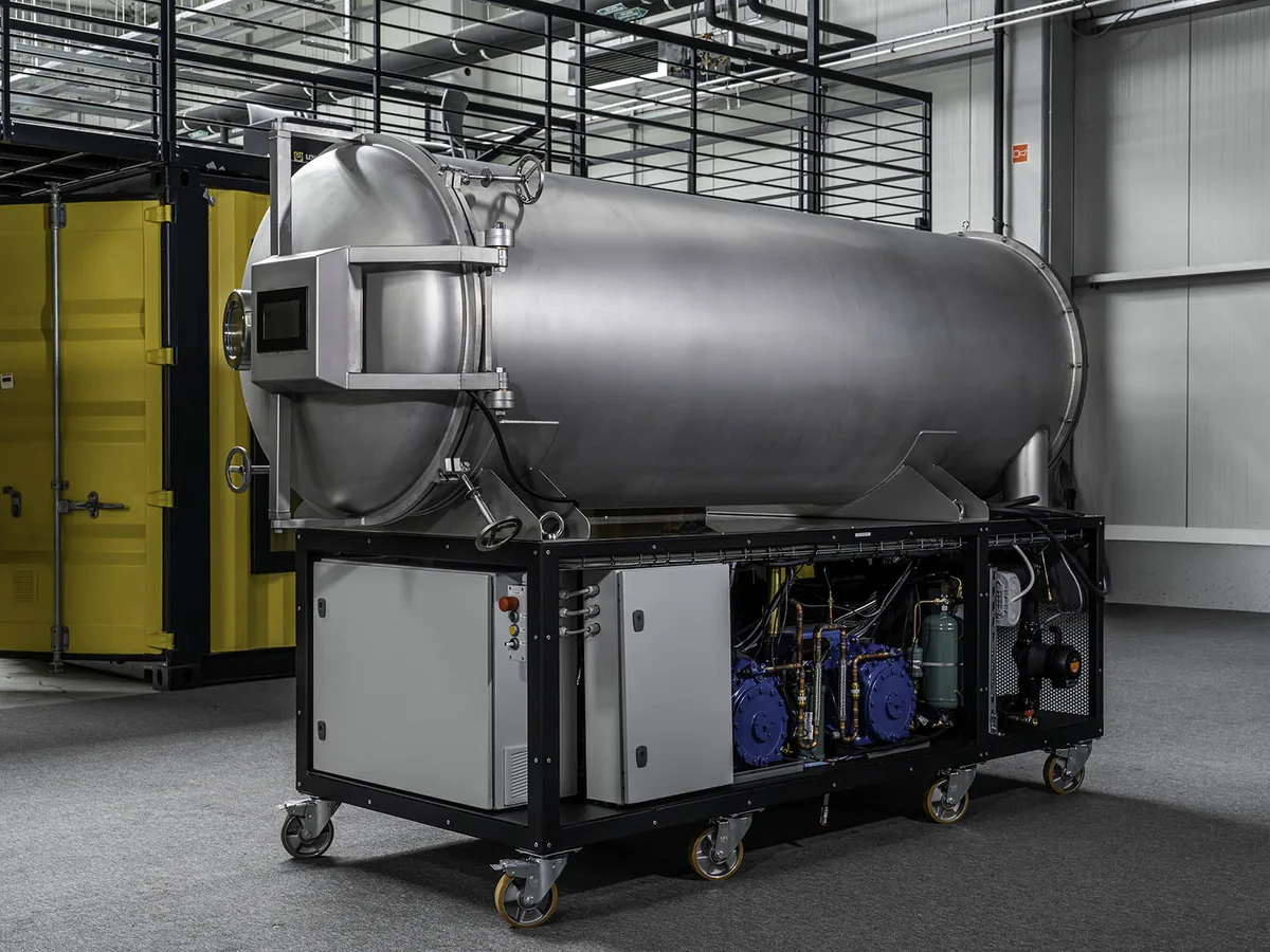 LEO-130 freeze dryer — three-quarter view from the control-panel side, refrigeration cabinet open